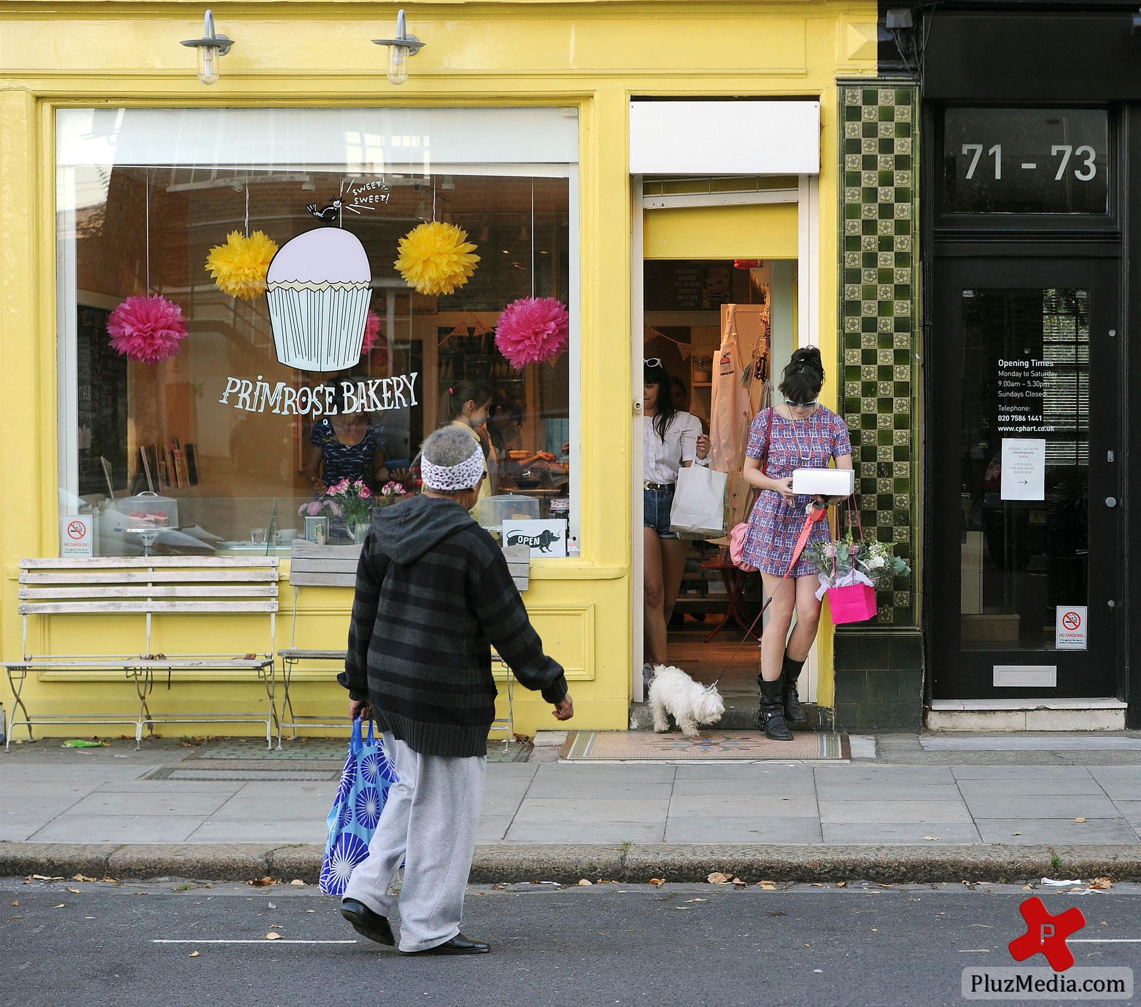 Daisy Lowe and a female companion walking her pet dog | Picture 89016